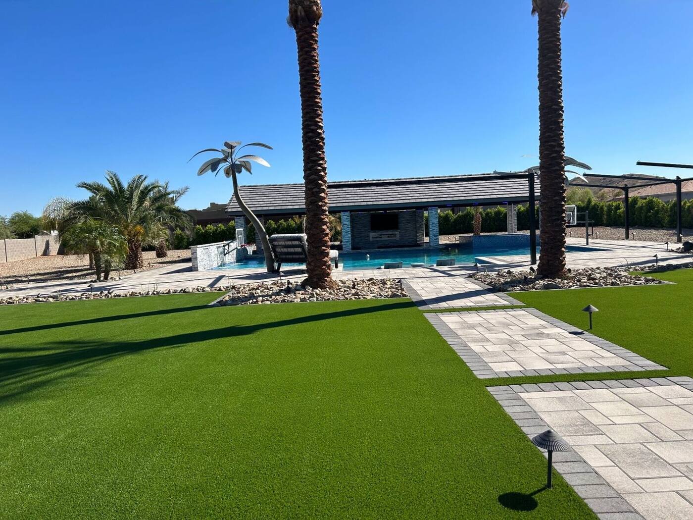 After — Dead lawn → Manicured turf & pavers